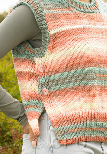 Details of side buttons and split in Ladies knitted Slipover in Peach Grove shade AC03 