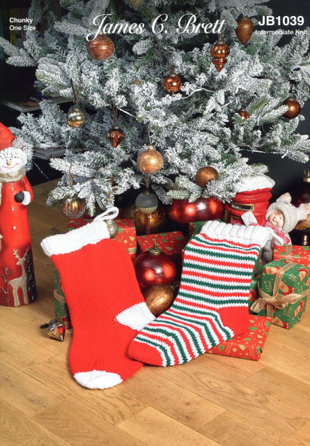 Knitted Christmas Stockings in Christmas colours - one is striped in red, white and green, the other is red with white heels, toes and top.  
